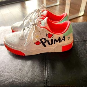Puma sneakers - size 6.5. Only worn a few times and my daughter outgrew them.